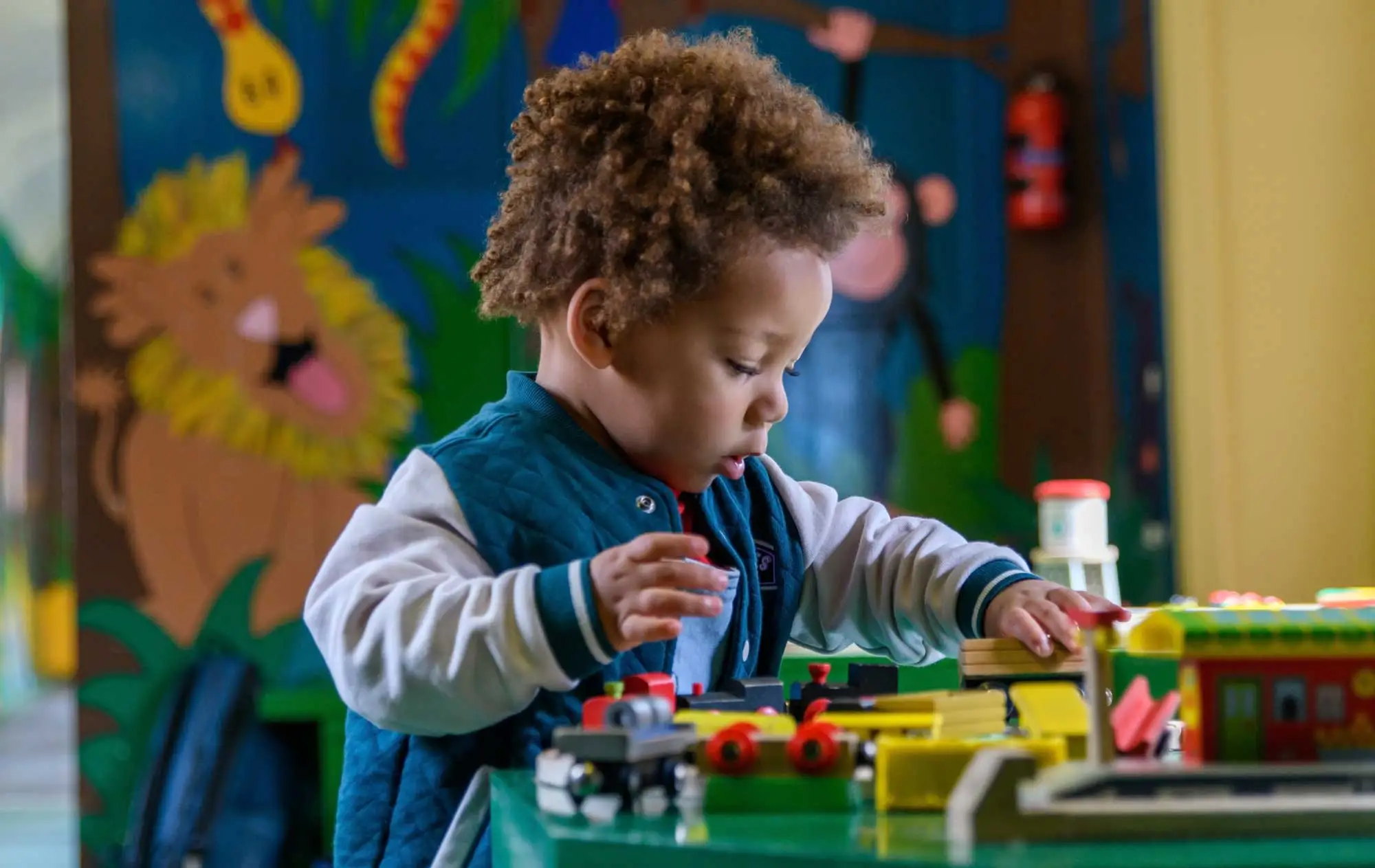 Child playing with toys at a child care center